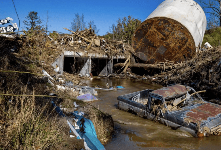 Picture of Little Crabtree Creek is littered with storm debris and vehicles, on Thursday, Oct. 17, 2024, three weeks after Hurricane Helene flooded the South Toe River and adjacent creeks near Micaville in Yancey County, N.C.
